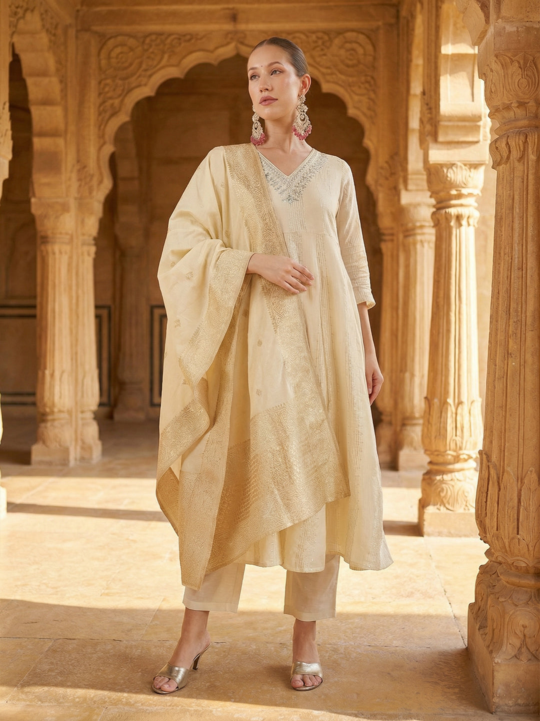 Rich Off white Embroidered A- Line Kurta sets