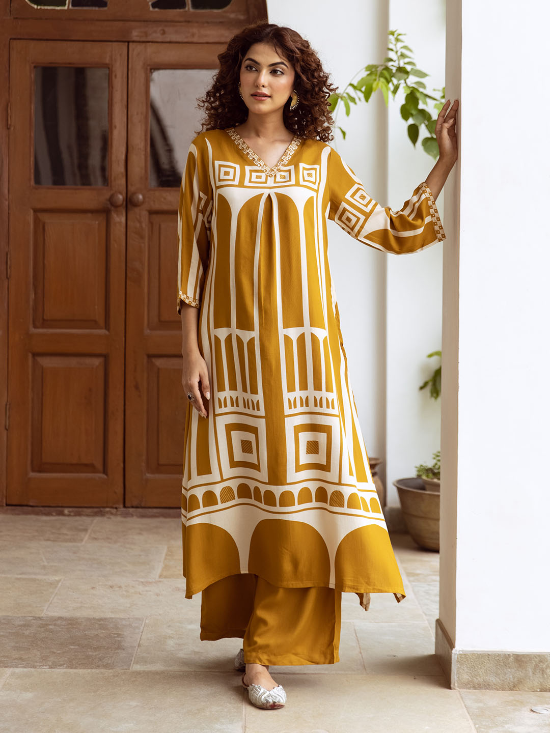Comfy Mustard Rayon Bold Printed A-Line Kurta Set With Straight Bottom
