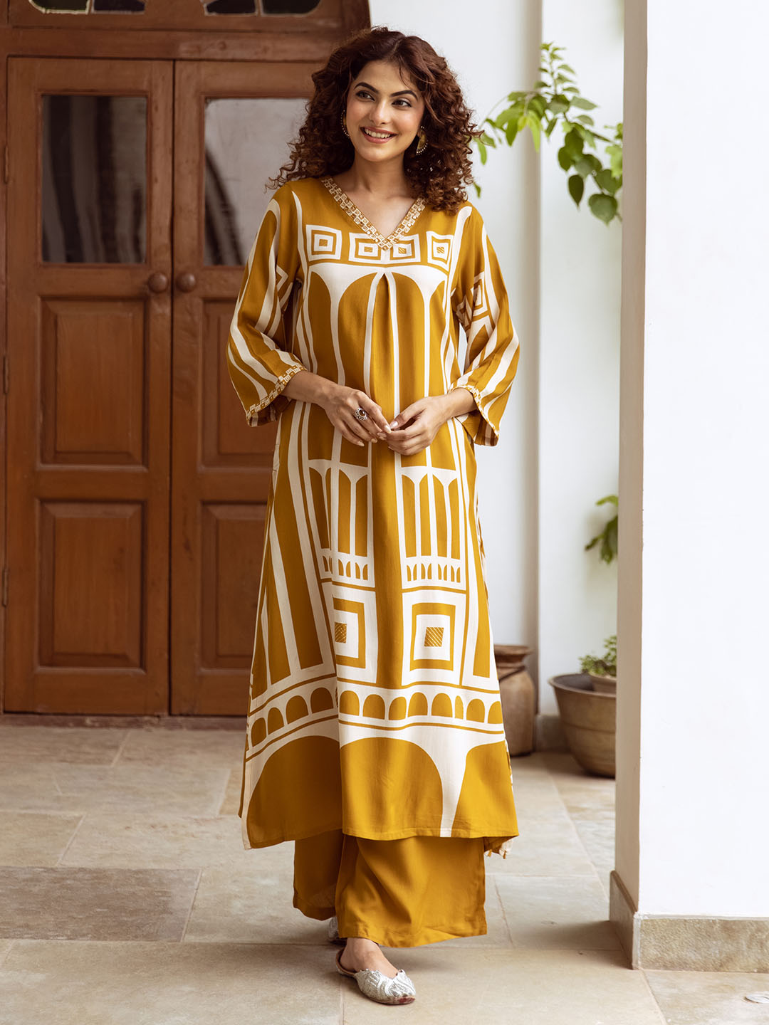Comfy Mustard Rayon Bold Printed A-Line Kurta Set With Straight Bottom