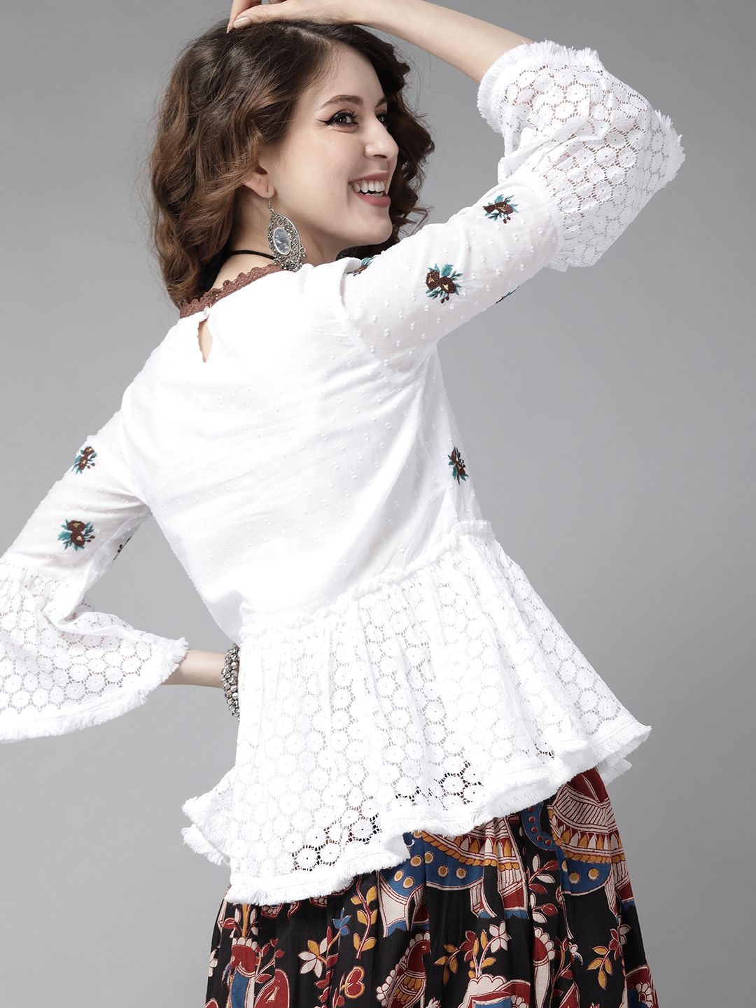 Soft Embroidered Peplum Top With Lace And Bell Sleeves