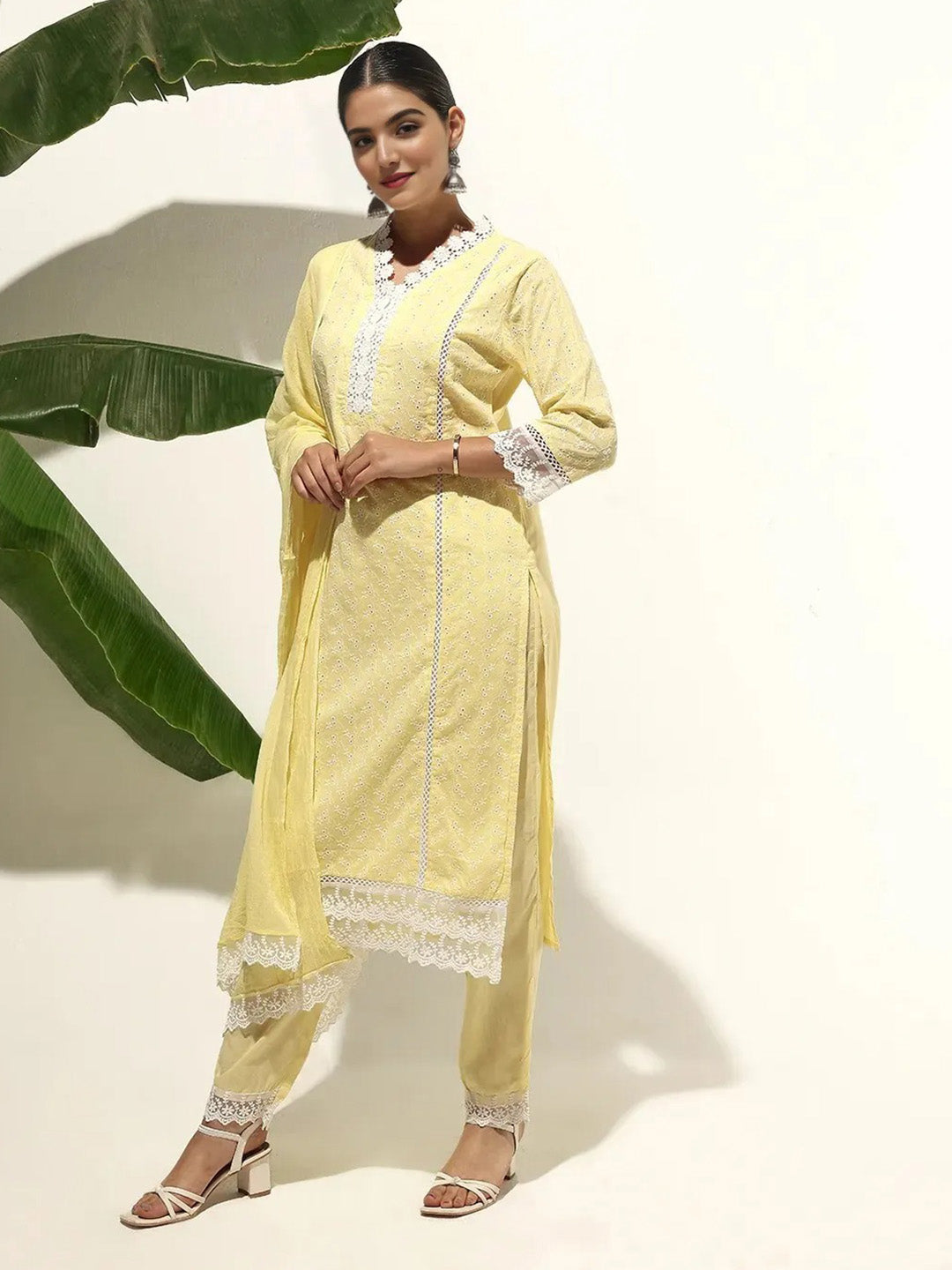 Graceful Yellow Cotton Schiffli Straight Fit  Kurta Set with floral Lace dupatta
