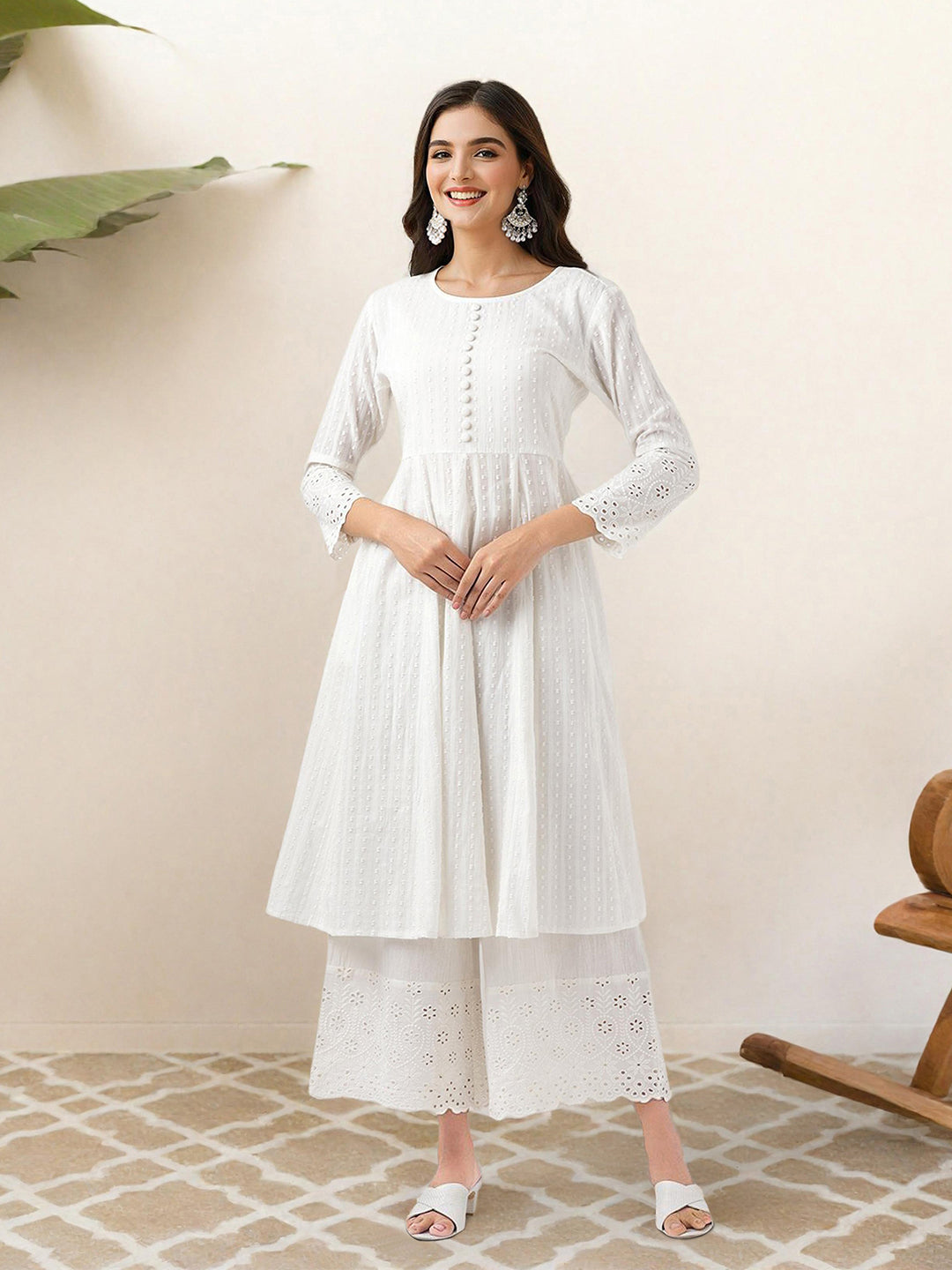 Comfy Off-White Pure Cotton Floral Printed Kurta Set With Gotta Patti Detailing And Straight Bottom
