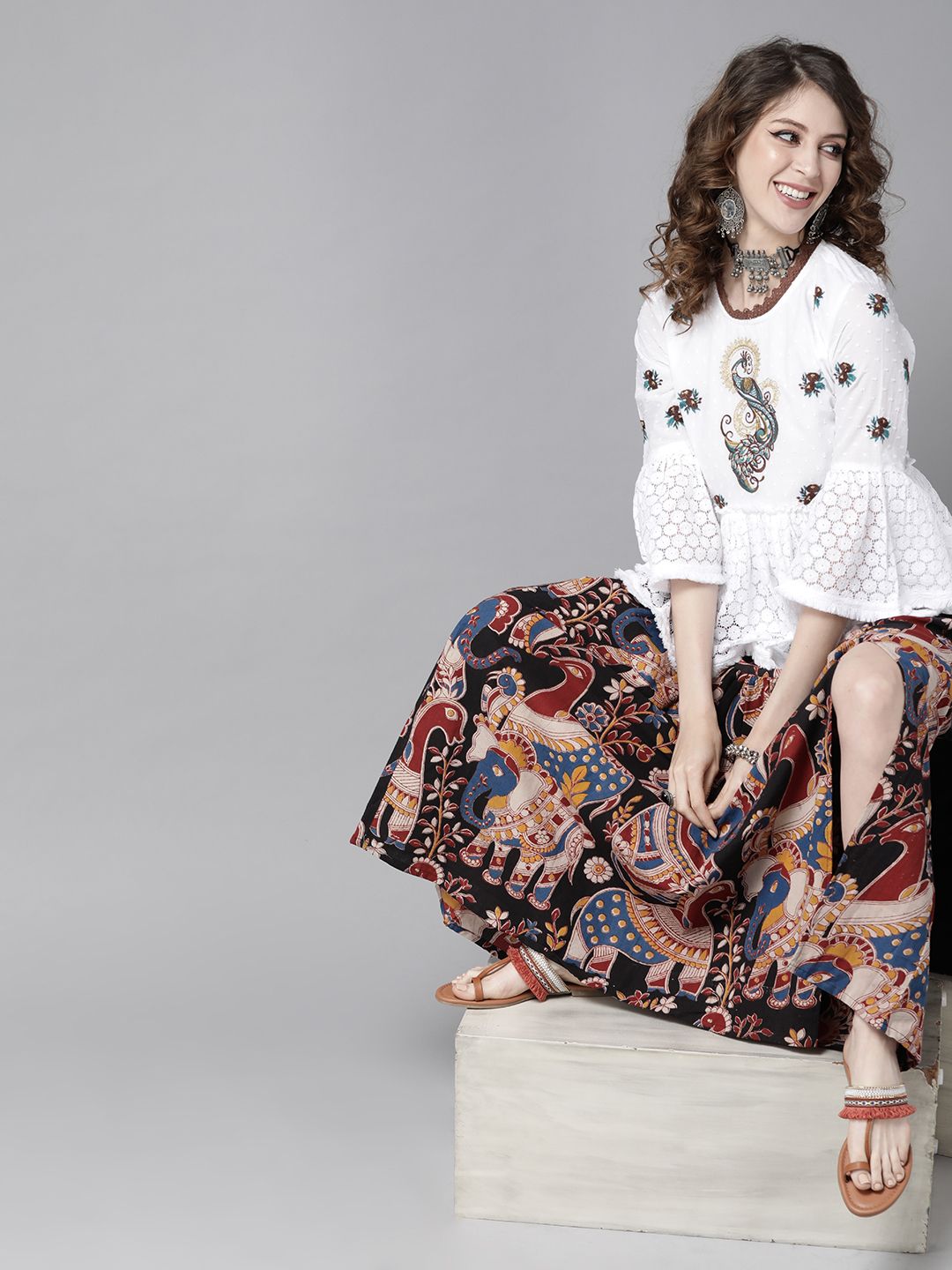 Soft Embroidered Peplum Top With Lace And Bell Sleeves