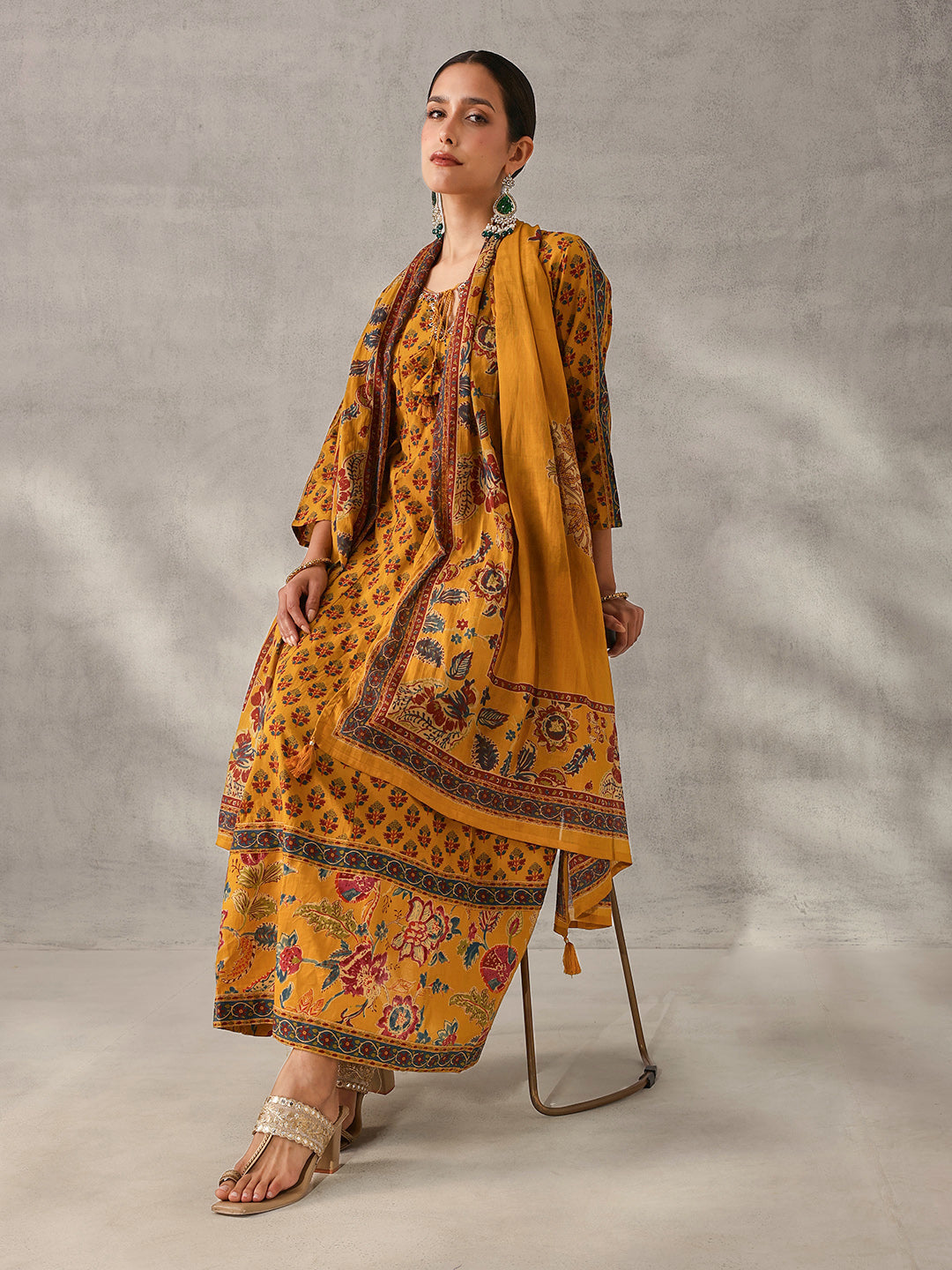 Graceful Mustard Cotton Floral Printed A-line fit Kurta Set with Dupatta