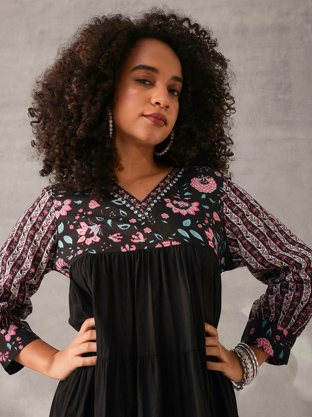 Graceful Black Cotton Floral Printed Tiered fit Gown 