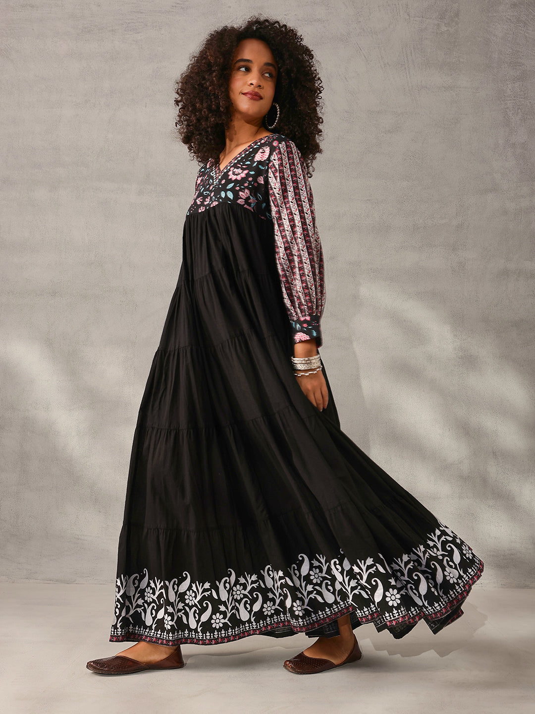 Graceful Black Cotton Floral Printed Tiered fit Gown 