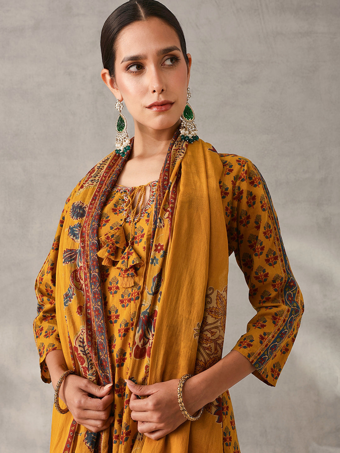 Graceful Mustard Cotton Floral Printed A-line fit Kurta Set with Dupatta