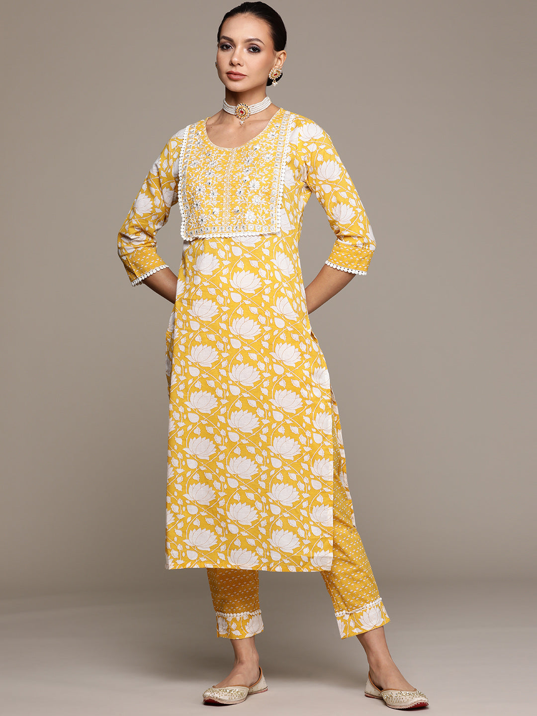 Ishin Women's Yellow Embroidered A-Liine Kurta with Trouser