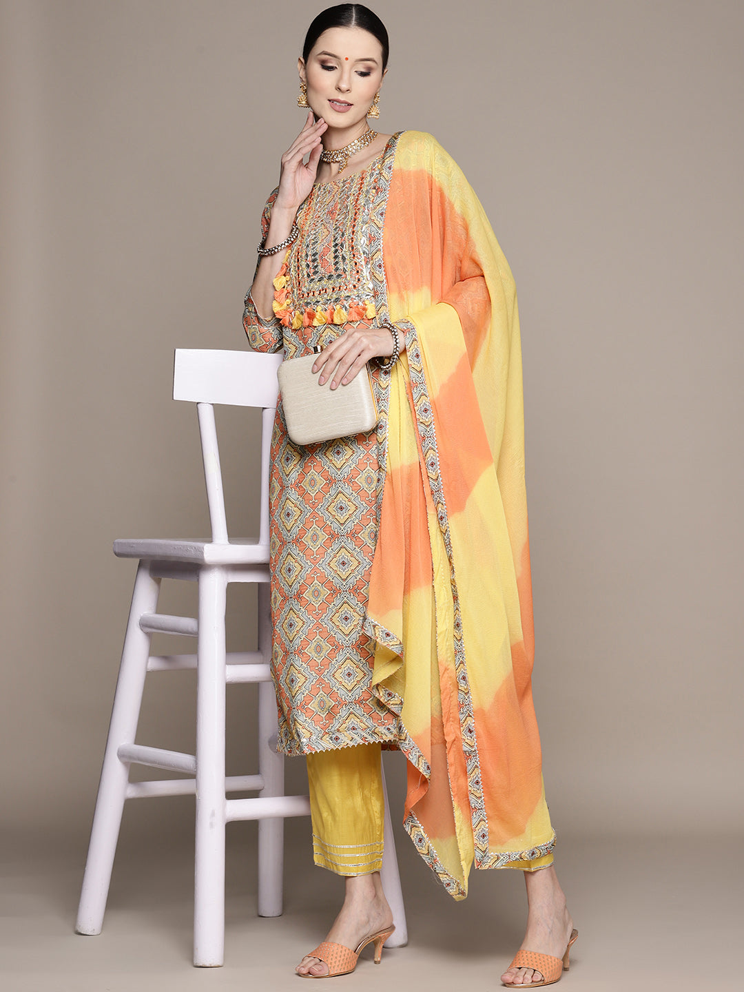 Ishin Women's Mustard Yoke Embroidered A-Line Kurta with Trouser & Dupatta