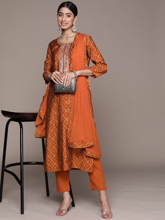 Ishin Women's Orange Embroidered Zari Flared Kurta Set with Pants & with Dupatta 