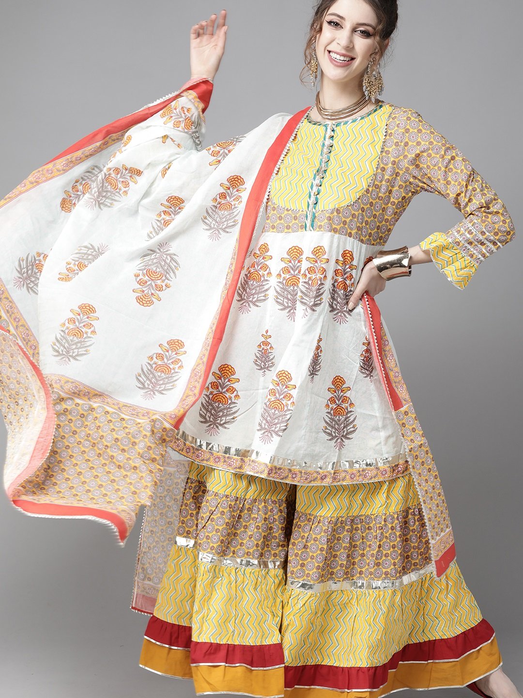 Ishin Women's Cotton Off White & Yellow Embellished Peplum Kurta Sharara Dupatta Set