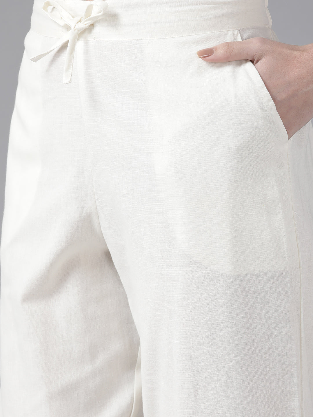 Ishin Women's Cotton Blend Pink & Off White Embroidered A-Line Kurta Trouser Set