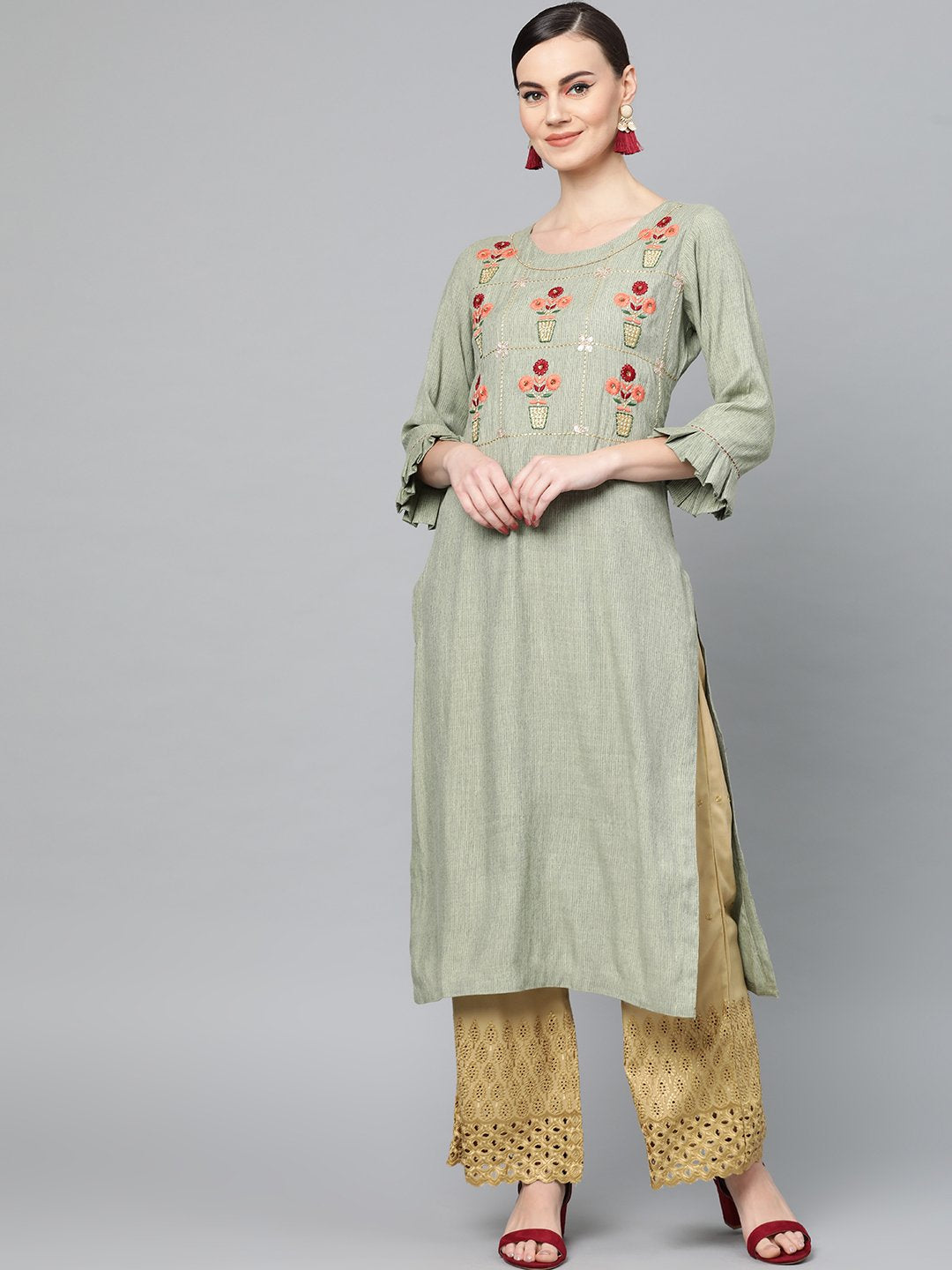 Ishin Women's Rayon Green Embroidered A-Line Kurta Palazzo Set